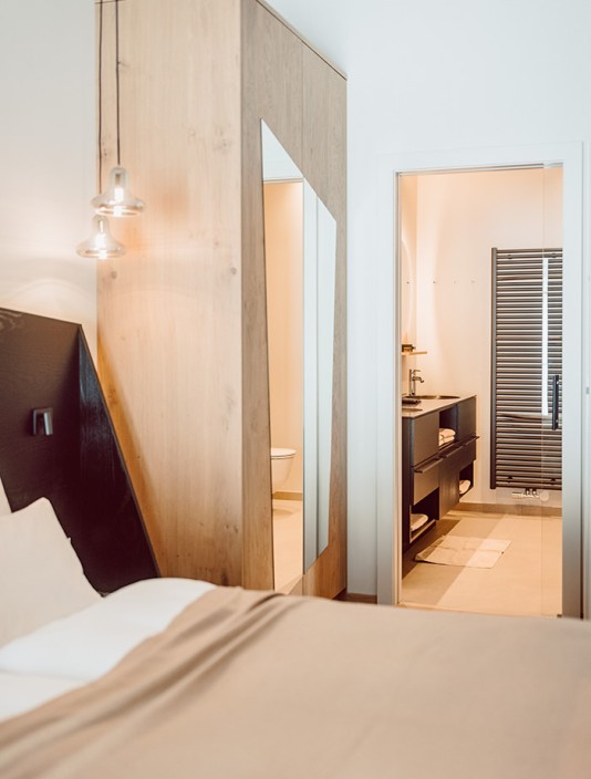 Schlafzimmer im Luxus-Apartment im Aparthotel JoAnn in Kleinarl