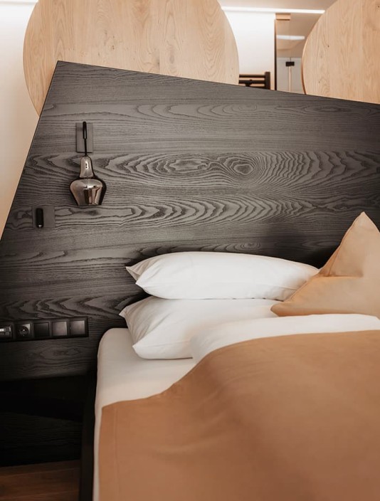 Doppelbett im Apartment im Luxus-Apartment im Aparthotel JoAnn in Kleinarl