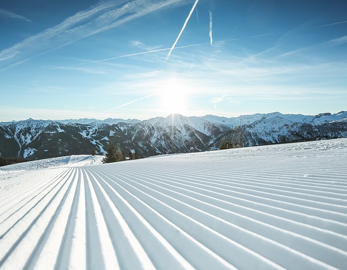 Skiurlaub auf perfekt präparierter Piste im Aparthotel JoAnn in Kleinarl